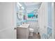 Cozy bathroom featuring modern fixtures, stylish tile accents, and a well-lit vanity at 421 77Th Ave, St Pete Beach, FL 33706