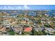 Beautiful aerial shot of the property in a friendly neighborhood with convenient access to local amenities at 10128 Paradise Blvd, Treasure Island, FL 33706