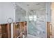 Newly renovated bathroom with modern fixtures, a large shower, and stylish tile at 10128 Paradise Blvd, Treasure Island, FL 33706
