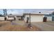 Charming single-story home featuring a well-maintained yard, attached garage, and classic curb appeal at 10128 Paradise Blvd, Treasure Island, FL 33706