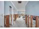 Open-concept home awaiting renovation, framed for sheetrock with water damage on the walls and floor at 10128 Paradise Blvd, Treasure Island, FL 33706