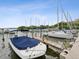 The boat slips on the water are surrounded by a variety of boats at 1055 Philippe Pkwy, Safety Harbor, FL 34695