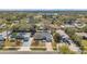 Street view of the property, surrounded by mature trees and neighborhood homes at 11712 128Th Ave, Largo, FL 33778