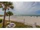 Scenic beach view near The Beach Cottage showing white sands, ocean, and recreational area at 18400 Gulf Blvd # 1505, Indian Shores, FL 33785