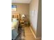 Bedroom with decorative chair and views at 18400 Gulf Blvd # 1505, Indian Shores, FL 33785