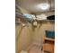 Walk-in closet with shelving for storage and hanging clothes at 18400 Gulf Blvd # 1505, Indian Shores, FL 33785