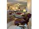 Comfortable living room with tile floors, neutral decor, and mirrors reflecting a bright, open space at 18400 Gulf Blvd # 1505, Indian Shores, FL 33785
