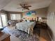 Spacious main bedroom featuring a king bed, private balcony access, and a serene coastal aesthetic at 18400 Gulf Blvd # 1505, Indian Shores, FL 33785