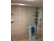 Shower with white tiles and glass doors and shower caddy at 18400 Gulf Blvd # 1505, Indian Shores, FL 33785