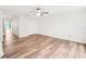 Bedroom with wood-look floors and ceiling fan at 2794 Countryside Blvd # 1, Clearwater, FL 33761