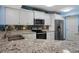 Well-appointed kitchen featuring stainless steel appliances and granite countertops at 5151 Isla Key S Blvd # 421, St Petersburg, FL 33715