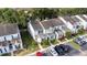 Aerial view showcasing a row of townhouses with dedicated parking at 6333 Osprey Lake Cir, Riverview, FL 33578