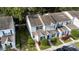 Charming two-story townhouse featuring blue shutters and well-maintained landscaping at 6333 Osprey Lake Cir, Riverview, FL 33578