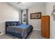 Cozy bedroom with comfortable bed, carpet, and a classic style at 14215 Swiss Bridge Dr, Riverview, FL 33579
