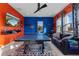 Fun game room featuring a ping pong table, comfortable seating, and vibrant decor at 14215 Swiss Bridge Dr, Riverview, FL 33579