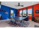 Spacious game room with ping pong table, sofa, and abundant natural light from multiple windows at 14215 Swiss Bridge Dr, Riverview, FL 33579