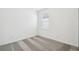 Bedroom with neutral carpeting and a single window at 4306 Big Sky Dr, Spring Hill, FL 34604