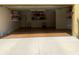 Spacious two car garage featuring ample storage shelving along the walls at 5849 Park N St # 201, St Petersburg, FL 33709