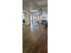 Lobby with mirrors, wood floors and comfortable seating creates an inviting space at 5849 Park N St # 201, St Petersburg, FL 33709