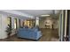 Community lobby with seating area, wood flooring, and decorative plants at 5849 Park N St # 201, St Petersburg, FL 33709
