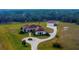 Expansive home and large detached garage, with circle drive on a well-manicured acreage at 6367 Foxbrook Trl, Parrish, FL 34219