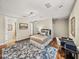 Bright bedroom featuring a plush rug, a writing desk, and a full sized bed at 3910 Gulf Blvd # 400, St Pete Beach, FL 33706