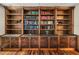 A beautifully crafted wooden bookcase with granite counters offers ample storage and display space at 3910 Gulf Blvd # 400, St Pete Beach, FL 33706
