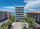 Stunning high-rise condominium with balconies overlooking the beach and blue skies at 3910 Gulf Blvd # 400, St Pete Beach, FL 33706