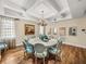 Open dining room with views, hardwood floors, and seating for eight at 3910 Gulf Blvd # 400, St Pete Beach, FL 33706