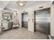Elegant elevators with decorative touches, adding sophistication to the condo's interior at 3910 Gulf Blvd # 400, St Pete Beach, FL 33706