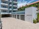 A row of residential garages offering convenient and secure parking for residents at 3910 Gulf Blvd # 400, St Pete Beach, FL 33706