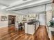 Kitchen featuring granite countertops, stainless steel appliances, and seating for four at the island at 3910 Gulf Blvd # 400, St Pete Beach, FL 33706