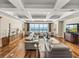 Bright living room offers comfortable seating, coffered ceilings, and stunning ocean views at 3910 Gulf Blvd # 400, St Pete Beach, FL 33706