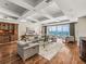 Bright living room provides ocean views, coffered ceilings, and comfortable seating at 3910 Gulf Blvd # 400, St Pete Beach, FL 33706