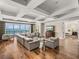 Spacious living room with floor to ceiling windows and ocean views at 3910 Gulf Blvd # 400, St Pete Beach, FL 33706