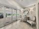 Elegant condo lobby featuring stylish seating and tiled floors, creating a welcoming atmosphere at 3910 Gulf Blvd # 400, St Pete Beach, FL 33706