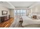 Serene main bedroom offering ocean view access to a private balcony and a plush king bed at 3910 Gulf Blvd # 400, St Pete Beach, FL 33706