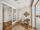 Bright office space featuring hardwood floors, neutral paint, and access to a private balcony at 3910 Gulf Blvd # 400, St Pete Beach, FL 33706