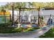 Charming backyard featuring a hammock and stylish hanging chairs at 6145 55Th N Ave, St Petersburg, FL 33709