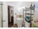 Cozy bathroom featuring a shower and tub combo, white vanity, and beach-themed decor at 6145 55Th N Ave, St Petersburg, FL 33709