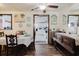 Cozy dining room with stylish furniture, nautical decor, and a view into the well-lit kitchen at 6145 55Th N Ave, St Petersburg, FL 33709