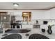 Modern kitchen featuring granite counters, stainless steel appliances, and tiled backsplash at 6145 55Th N Ave, St Petersburg, FL 33709