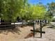 Horsepower Ranch entrance sign next to a country road with bamboo and a split rail fence at 7418 Bay Dr, Tampa, FL 33635