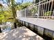 Waterfront view showcasing a dock and seawall, offering direct access to waterways and outdoor activities at 7418 Bay Dr, Tampa, FL 33635