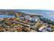 High-angle aerial view of a neighborhood near a body of water on a sunny day at 1330 Snell Isle Ne Blvd # 4, St Petersburg, FL 33704