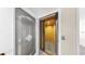 Interior shot of home elevator with wood-paneled interior and safety features at 443 Pinellas Bayway S # 105, Tierra Verde, FL 33715