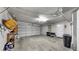 Clean, well-lit garage offering ample space for parking and storage at 443 Pinellas Bayway S # 105, Tierra Verde, FL 33715