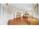 Large main bedroom featuring wood floors, vaulted ceiling, and ensuite bathroom at 443 Pinellas Bayway S # 105, Tierra Verde, FL 33715