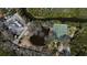 An aerial view of the community pond, tennis court and boat storage area at 764 Captiva Ne Ct, St Petersburg, FL 33702