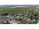 An aerial view of a neighborhood with lush greenery and waterway access at 764 Captiva Ne Ct, St Petersburg, FL 33702